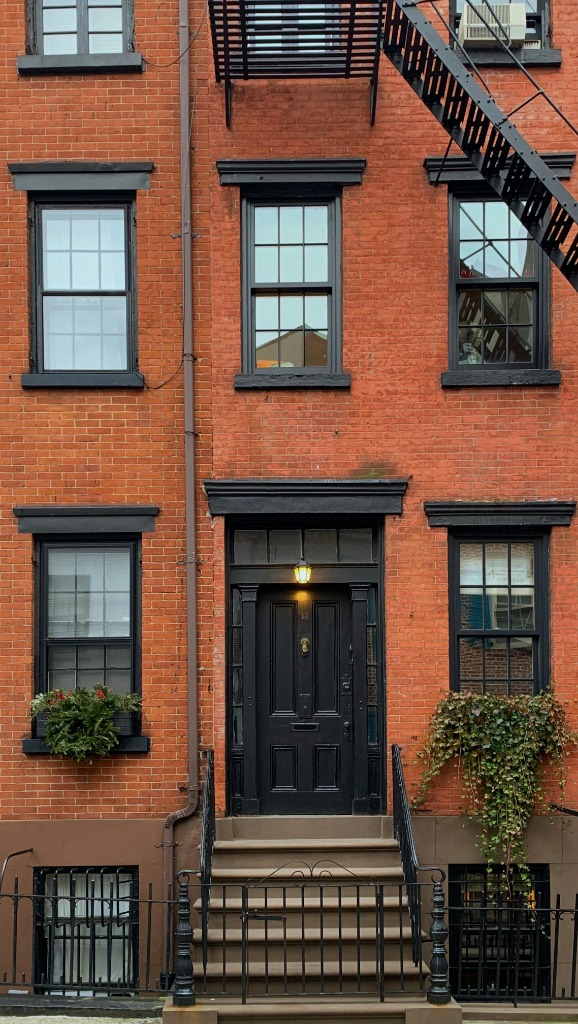Brick brownstone building facade