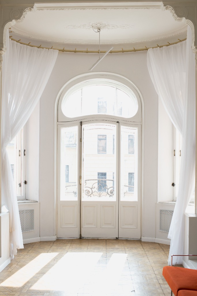 Breathtaking arched double doors leading to balcony